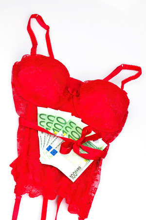 red lingerie and bills  prostitution and mercenary love の写真素材