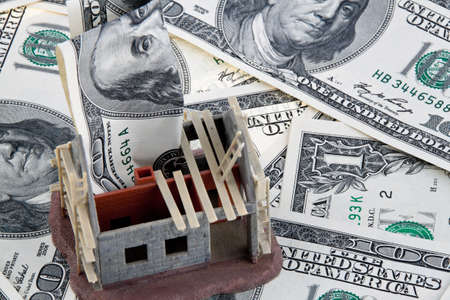 a shell house  funding with dollar billsの写真素材