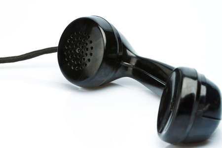 telephone an old, old landline. phone on a white background.の写真素材