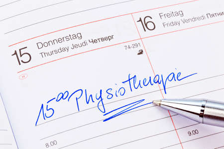 an appointment is entered on a calendar  physiotherapyの写真素材