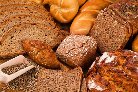 several different types of bread  healthy diet with fresh baked goods 