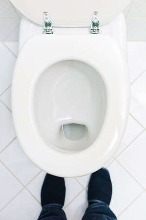a sanitary flush toilet in a household  bathroom and toiletの写真素材