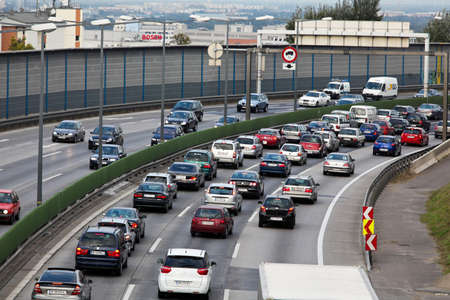traffic jam in the road with cars on a highway traffic jam in the road with cars on a highway