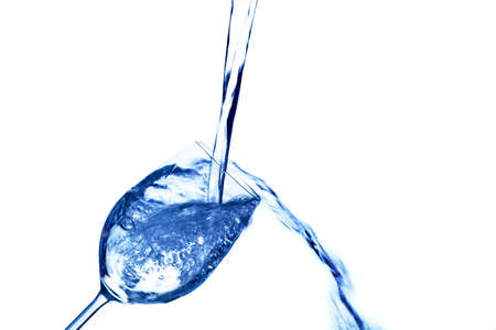 pure, clean water is poured into a glass  drinking water in a teacup の写真素材