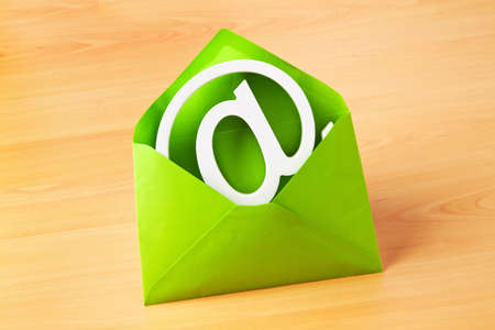 an envelope with an e-mail sign  modern communication の写真素材