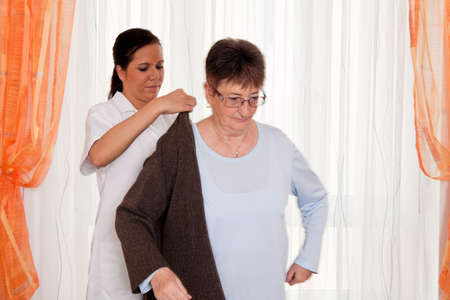 a nurse in elderly care for the elderly in nursing homesの写真素材