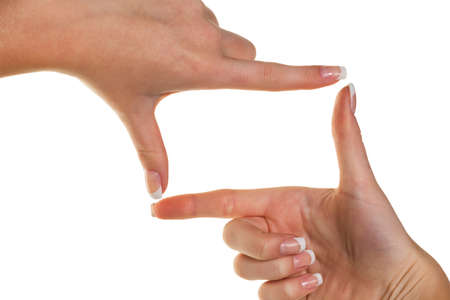 hands making a frame with her fingers. symbolic photo for bigotry and perspectiveの写真素材
