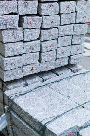 granite stones for paving a road on a road construction siteの写真素材