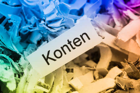 shredded paper tagged accounts, symbol photo for finance, accounting and double-entry bookkeepingの写真素材