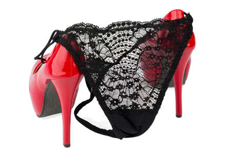 red high heels and a black slip, symbol photo adult and fetish