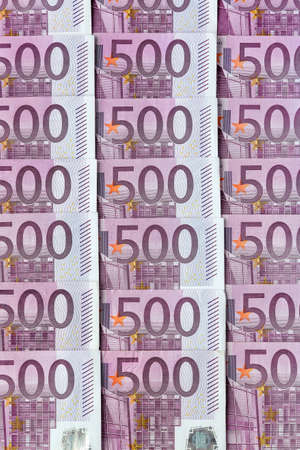 many five hundred euro banknotes lie side by side  symbolic photo for wealth and investmentの写真素材