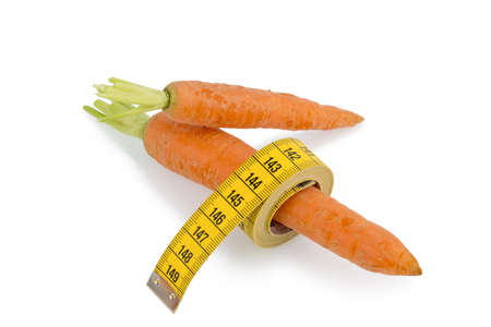 organically grown carrots with tape  fresh fruit and vegetables are always healthy icon for healthy diet の写真素材