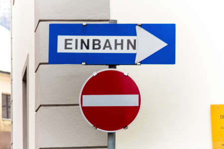 way street, two road signs, symbolic for traffic regulations, direction, clarityの写真素材