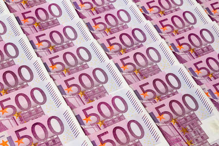 many of five hundred euro banknotes lie side by side  photo icon for wealth and investmentの写真素材