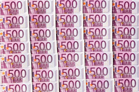 five hundred euro banknotes lie side by side