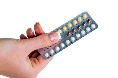 a hand holding pills. symbolic photo for prevention.の写真素材