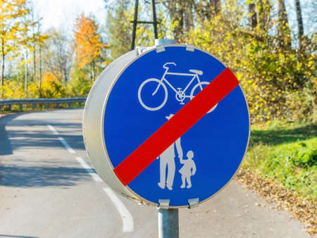 sign for bike path and walkway. impact on road trafficの写真素材