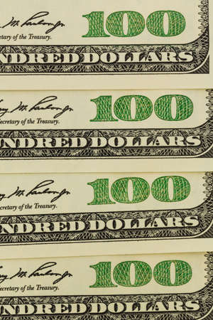 many american dollar bills. symbolic photo for debts and wealth