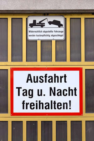 sign exit keep free day and night. warning for towingの写真素材