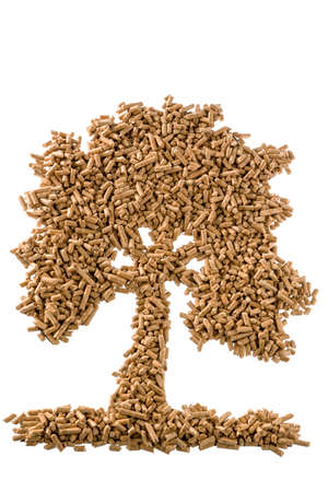 symbol photo tree of pellets for heating and heat from alternative, renewable energy sources.の写真素材
