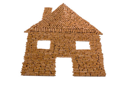 a house built of pellets for heating  alternative and sustainable energy for heatingの写真素材