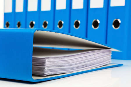 file folder with documents and documents. retention of contracts.