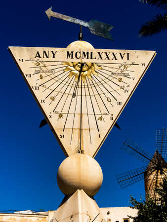 a sundial in the city of palma on mallora, spain.