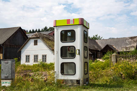 a phone booth in a small village in lower austria. kautzen in the waldviertelの写真素材