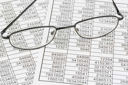 a table with the figures of revenue and expenditureの写真素材