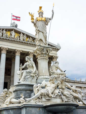 the parliament in vienna, austria. with the statue of "pallas athene" the greek goddess of wisdom.の写真素材