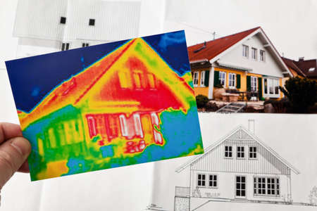 saving energy through thermal insulation. house with thermal imaging camera photographed.の写真素材