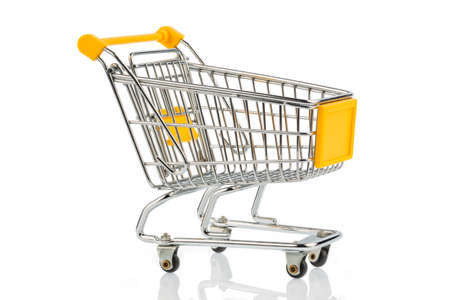 an empty shopping cart on white background. symbolic photo for shoppingの写真素材