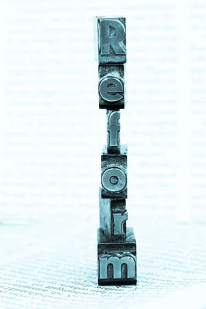 the word "reform" in lead letters written. symbol photo for quick correspondenceの写真素材