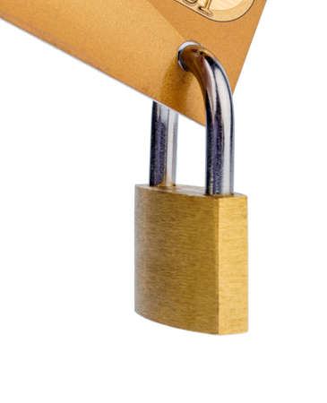 a gold credit card and padlock. symbol photo for cashless purchases and status symbols.