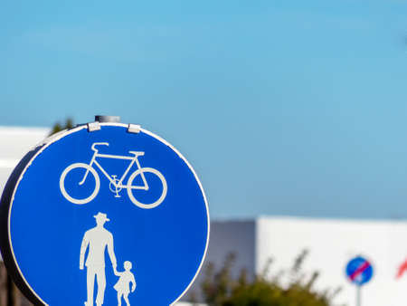 sign for bike path and walkway. each other on the roadの写真素材