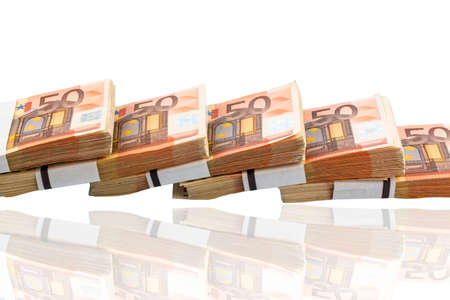 stack of many fifty euro banknotes. photo icon for money, wealth, income and expenditureの写真素材