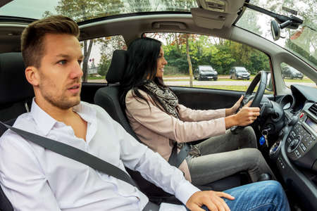 a couple traveling in a car