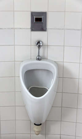 urinal in a toilet for men. men toiletの写真素材