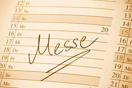 an appointment is entered on a calendar fairの写真素材