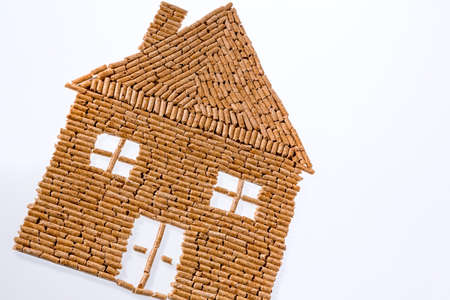 a house built of pellets for heating. alternative and sustainable energy for heatingの写真素材