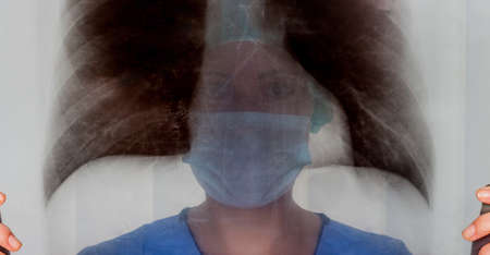 a nurse or doctor in surgical clothing before surgery. symbolic photo for work in the hospitalの写真素材