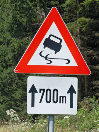 warning skidding on slippery roadの写真素材