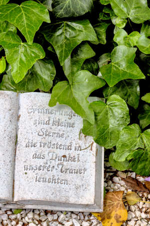 tomb with inscription, death, memory, faith and impermanenceの写真素材