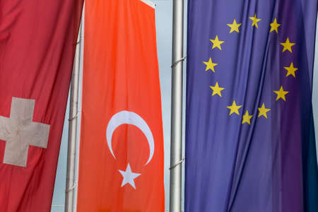 european flag and other flags, symbols for eu membership for turkey