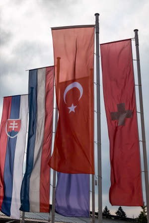 european flag and other flags, symbols for diplomacy and international cooperationの写真素材