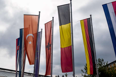 european flag and other flags, symbols for diplomacy and international cooperationの写真素材