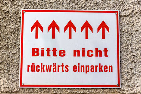 sign with directional arrows, symbolizing direction, order, prohibition,の写真素材