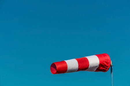 a windsock inflated by the wind. photo icon for power and successの写真素材