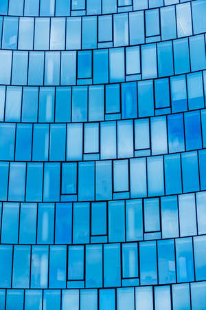 the windows of a modern building for offices