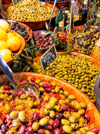 selection of olives on a market, symbolic photo for food, fresh, healthy foodの写真素材